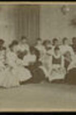Group of female students sewing.