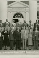 A group stands outside of Brownlee Hall at the National Negro Business Bankers Association's 25th Annual Convention.