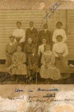 Dora M. Gloster with her class at Howe Institute in Brownsville, Tennessee. Written on recto: Class in Brownsville. Second from left is Mrs. Daora Morris G[loster].