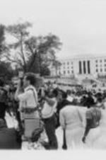 Joseph E. Lowery addresses the press and demonstrators on the steps of an unidentified building in Montgomery, Alabama.