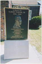 A photo of the historical marker presented by SCLC/W.O.M.E.N. to commemorate Albert Turner, Sr.