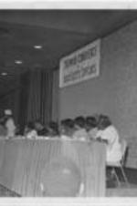 A woman speaks at a Southern Conference of Black Elected Officials meeting.