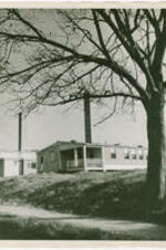 Temporary housing units erected by the U.S. Army to house veterans attending Atlanta University under the G.I. Bill. Written on verso: Veterans'  housing, - Atlanta University '46