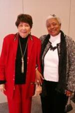 Evelyn G. Lowery poses for a photo with an unidentified woman at the 32nd Annual SCLC/W.O.M.E.N. Christmas party for senior citizens in Atlanta, Georgia.