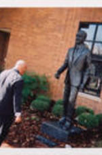 U.S. Representative John Lewis looks at the statue of Fred Shuttlesworth displayed at the Birmingham Civil Rights Institute.