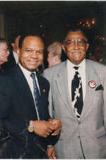 Southern Christian Leadership Conference (SCLC) President Joseph E. Lowery and SCLC Board Chair Walter E. Fauntroy pose for a photo at unknown event.