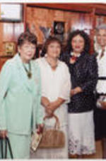 Evelyn G. Lowery poses for a photo with her daughters Yvonne, Cheryl, and Karen, Muriel Durley, and Reverend Gerald Durley at Providence Missionary Baptist Church in Atlanta, Georgia.