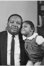 C. Eric Lincoln and his daughter Hilary. Written on verso: Book cover jacket for "Is Anybody Listening?"