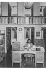Students studying at the library, possibly the Gilbert Haven Memorial Library.