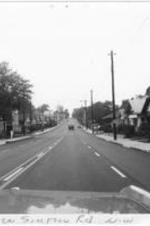 View of Simpson Road Northwest (now Joseph E. Boone Blvd) from a car.