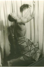 Portrait of Alvin Ailey dancing. Written on verso: Alvin Ailey; Photograph by Carl Van Vechten; 146 Central Park West; Cannot be reproduced without permission; March 22, 1955.