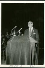 Unidentified man giving a speech during the 1974 "Henderson, We Love you Madly Day" Celebration.