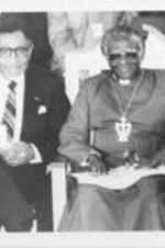 Southern Christian Leadership Conference President Joseph E. Lowery and Bishop Desmond Tutu sit in attendance at an International Conference Against Apartheid held at Ebenezer Baptist Church in Atlanta, Georgia.