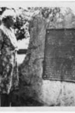 Myron N. Adams visits a memorial site. Written on verso: Mrs. Myron N. Adams; Nellie Adams. Myron N. Adams visits a memorial site for Edmund Asa Ware's.
