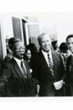 Written on verso: (l-r) Leonard De Paur (Honorary Degree Recipient), President Hugh M. Gloster, Honorable Andrew Young, Mayor, City of Atlanta. Commencement, May 23, 1982.
