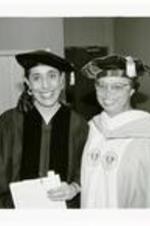 View of Audrey F. Manley and Lani Guinier at commencement. Written on verso: Commencement, 1998 - Pres. Audrey F. Manley and Lani Guinier, honorary degree recipient and speaker.