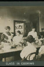 Class in cooking with unidentified students.