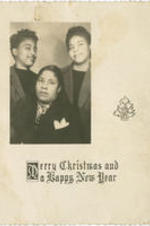 A Christmas card featuring a picture of three unidentified women.