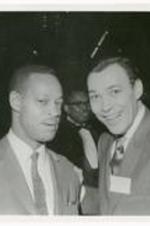 Portrait of two men wearing suits, one with name tag "H. S. Murphy, 1951."