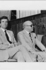 From left to right, Senator Gary Hart, Reverend Jesse Douglas, and Congressional Black Caucus Chair Julian Dixon sit during an event held at the 28th Annual Southern Christian Leadership Conference Convention in Montgomery, Alabama.