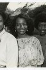 Group portrait of three women. Written on verso: "Miss Morris Brown and Court 1982; (LR Myra Brown, Cassandra Hopkins, Linda Fountain); Miss MBC 3 Attendants".
