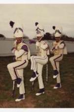 Out door group portrait. Written on verso: "From left to right; 1. Harold Rogers, 2. Quincy Cason, 3. Roderick Blake; Morris Brown Clg. Drum Majors 1985".