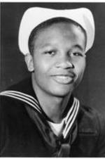 Portrait of C. Eric Lincoln as a young man wearing a navy uniform.