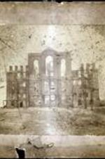 A burned Chrisman Hall, possibly on the Gammon campus. Written on recto: Chrisman Hall, burned April 14, '92.