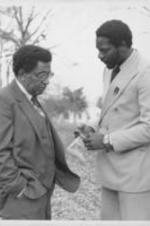 Southern Christian Leadership Conference President Joseph E. Lowery is shown with an unidentified man at a groundbreaking ceremony for the Wesley Plaza housing development in Baton Rouge, Louisiana. A photo from this event is featured on page 71 of the June-July 1981 SCLC Magazine issue: http://hdl.handle.net/20.500.12322/auc.199:07018.