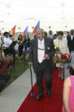 Joseph and Evelyn Lowery walk along a red carpet as they enter the Martin Luther King Jr. International Chapel for an Easter Sunday worship service, during which the Lowerys were awarded the Gandhi-King-Ikeda Community Builders Prize. Joseph E. Lowery delivered the Easter Sunday address in the chapel and in addition to the award, the Lowerys were presented with a portrait of themselves.