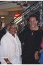 View of Dr. Hilliard, Patsy Jo, and others. Written on verso: July 1999, NY Airport.