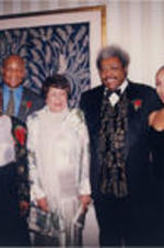 Joseph and Evelyn Lowery pose for a photo with recipients of Drum Major for Justice Awards at the 18th Annual SCLC/W.O.M.E.N. Drum Major for Justice Awards dinner. From left to right: Joseph E. Lowery, Esther Rolle, George Foreman, Evelyn G. Lowery, Don King, unidentified woman, Kweisi Mfume.