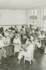View of students sitting in a classroom.