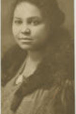 Portrait of an unidentified woman with a fur scarf.