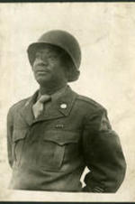Image of Trezzvant Anderson standing in his military uniform.