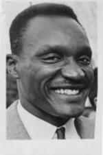 Fred Shuttlesworth is shown smiling.