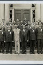 Brailsford R. Brazeal (front row, second from right) with a group of professors in front of the Trevor Arnett building on the campus of Atlanta University.