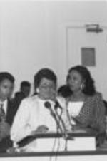 SCLC/WOMEN President Evelyn G. Lowery is shown speaking alongside Carolyn Watson and others at the 32nd Annual Southern Christian Leadership Conference Convention in Atlanta, Georgia.