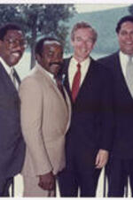 Maynard Jackson and others pose for a photo. Written on verso: ca. 1988 Clark College. Arrington, Marvin, Maynard Jackson. 1988.