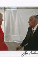 Joseph E. Lowery is shown speaking with Jill Biden, the Second Lady of the United States. The photo is signed by Biden.