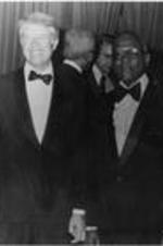 James P. Brawley at a reception with Jimmy Carter and two unidentified men.