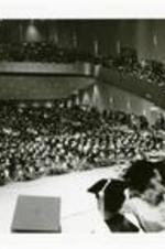 Written on verso: Spelman College 1989 Commencement. Ms. Camille Olivia Hanks Cosby, speaker and audience.