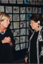 Evelyn G. Lowery talks with Sarah Brady in front of the SCLC/W.O.M.E.N. National Memorial "Stop the Killing" Quilt.