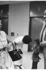 A man and woman share a laugh at the Conference to Access the State of Black Arts and Letters in Chicago, IL. May 26-28, 1972.