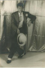Portrait of Avon Long dancing. Written on verso: Avon Long, star in "Porgy and Bess"; Photograph by Carl Van Vechten; 101 Central Park West; Cannot be reproduced without permission.
