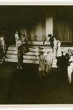 View of actors on stage. Written on verso: The University Players Production; Everybody Join Hands, 1942-43.
