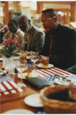 Unidentified men at a restaurant in Heidelberg, Germany. The NAACP held their 13th annual Martin Luther King, Jr. international commemoration at the University of Heidelberg.
