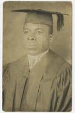 Portrait of an unidentified man wearing graduation cap and gown.