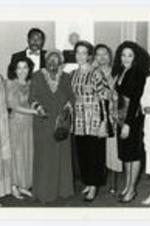 Group portait with president Dr. Johnnetta Betsch Cole. Written on verso: President Dr. Johnnetta Betsch Cole at the Essence Awards in 1989.