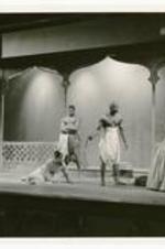 View of actors performing in "The King and I" on stage.